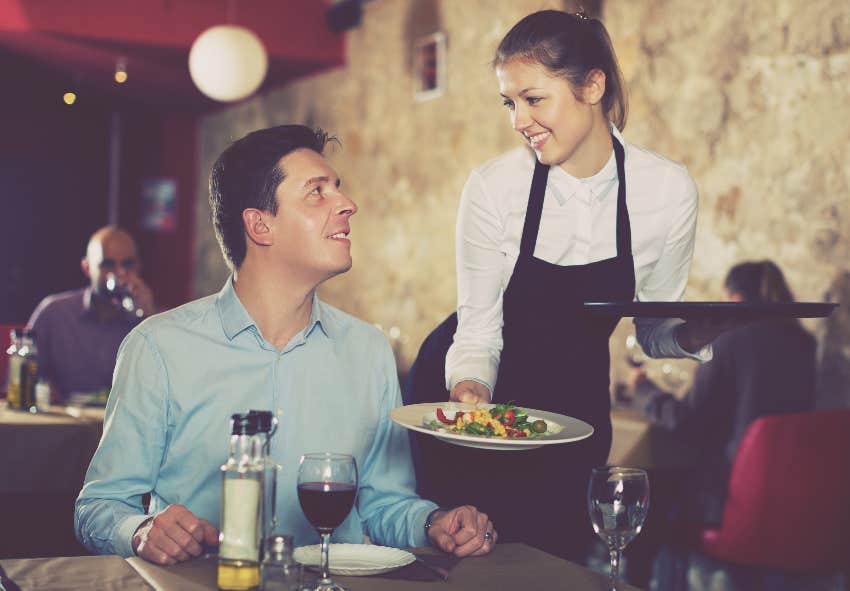 female server flirting with male patron