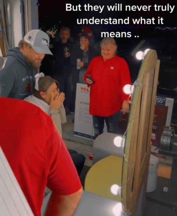 woman surprised with vanity by husband's family of 3 boys